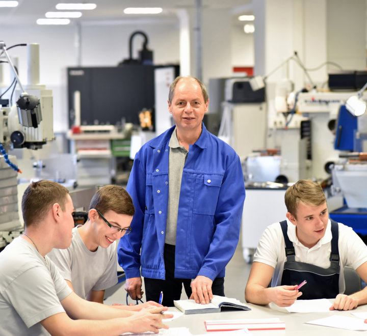 group of young people in technical vocational training