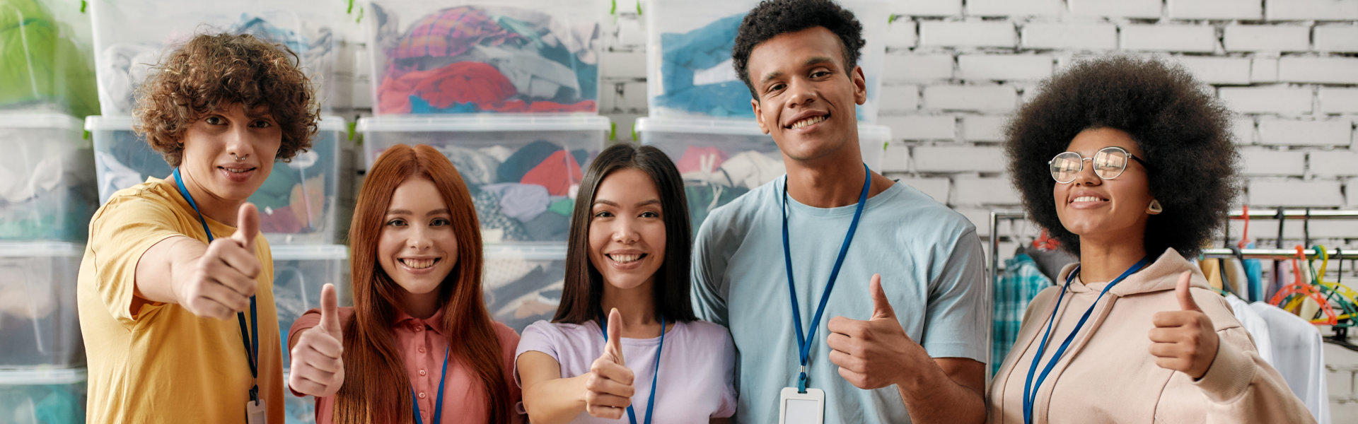 group of young people doing thumbs up