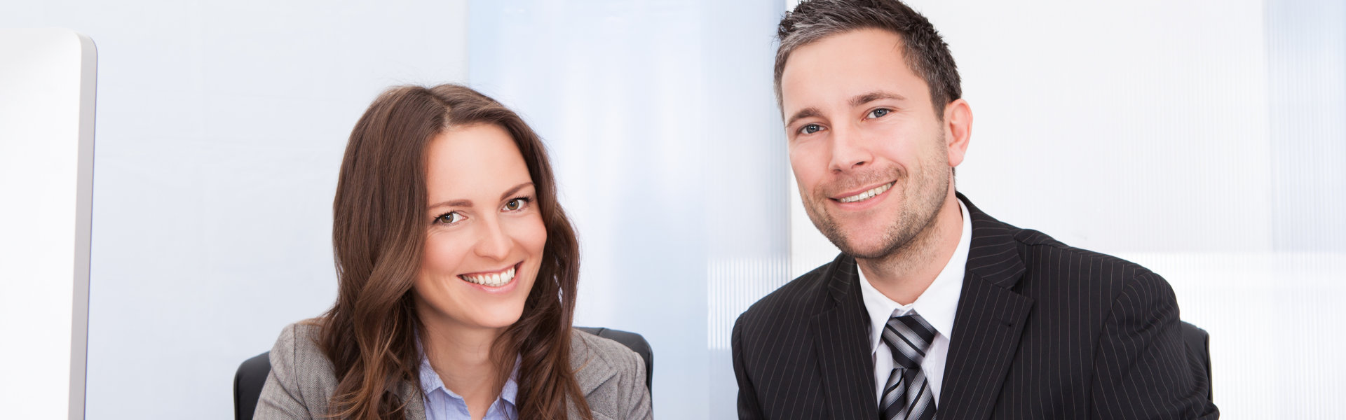 young woman and man smiling